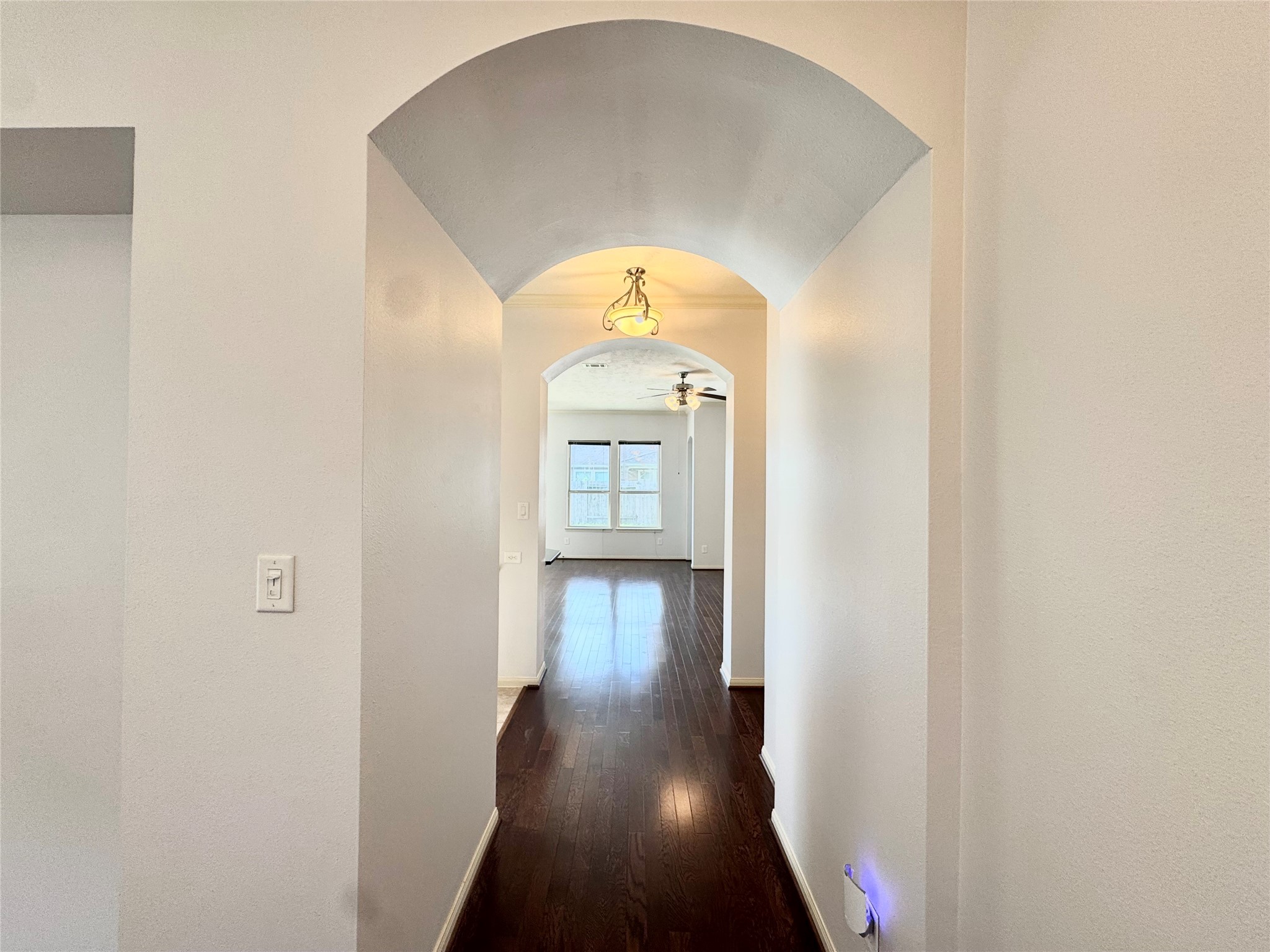 12407 Point Arbor Court Tomball, TX 77377 - Photo 7 of 18 a view of a hallway view with wooden floor