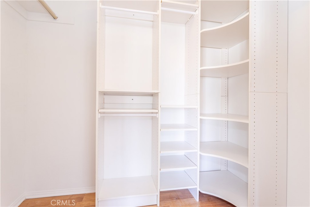 12067 Turtle Springs Court Porter Ranch, CA 91326 - Photo 20 of 34 a view of walk in closet with empty racks