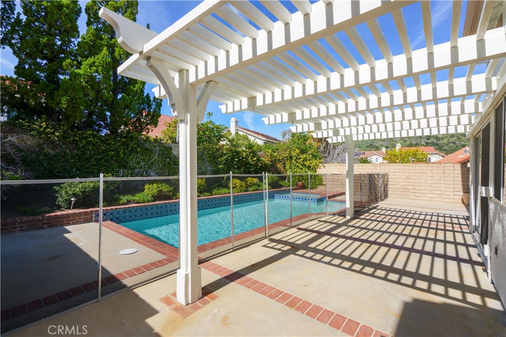 12067 Turtle Springs Court Porter Ranch, CA 91326 - Photo 34 of 34 a view of a backyard with sitting area