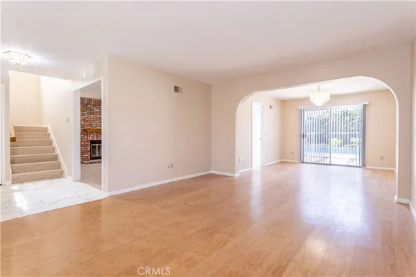 a view of a kitchen with a sink and cabinets