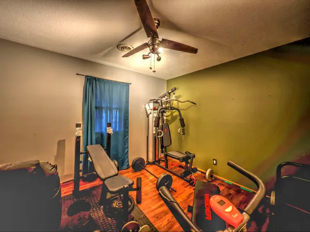 a very nice looking room with a dining table and a chandelier