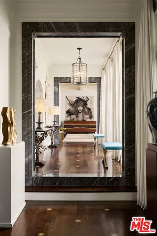 a view of a living room and dining room