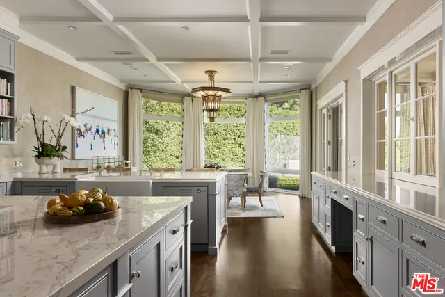 a kitchen with stainless steel appliances granite countertop a stove and a sink