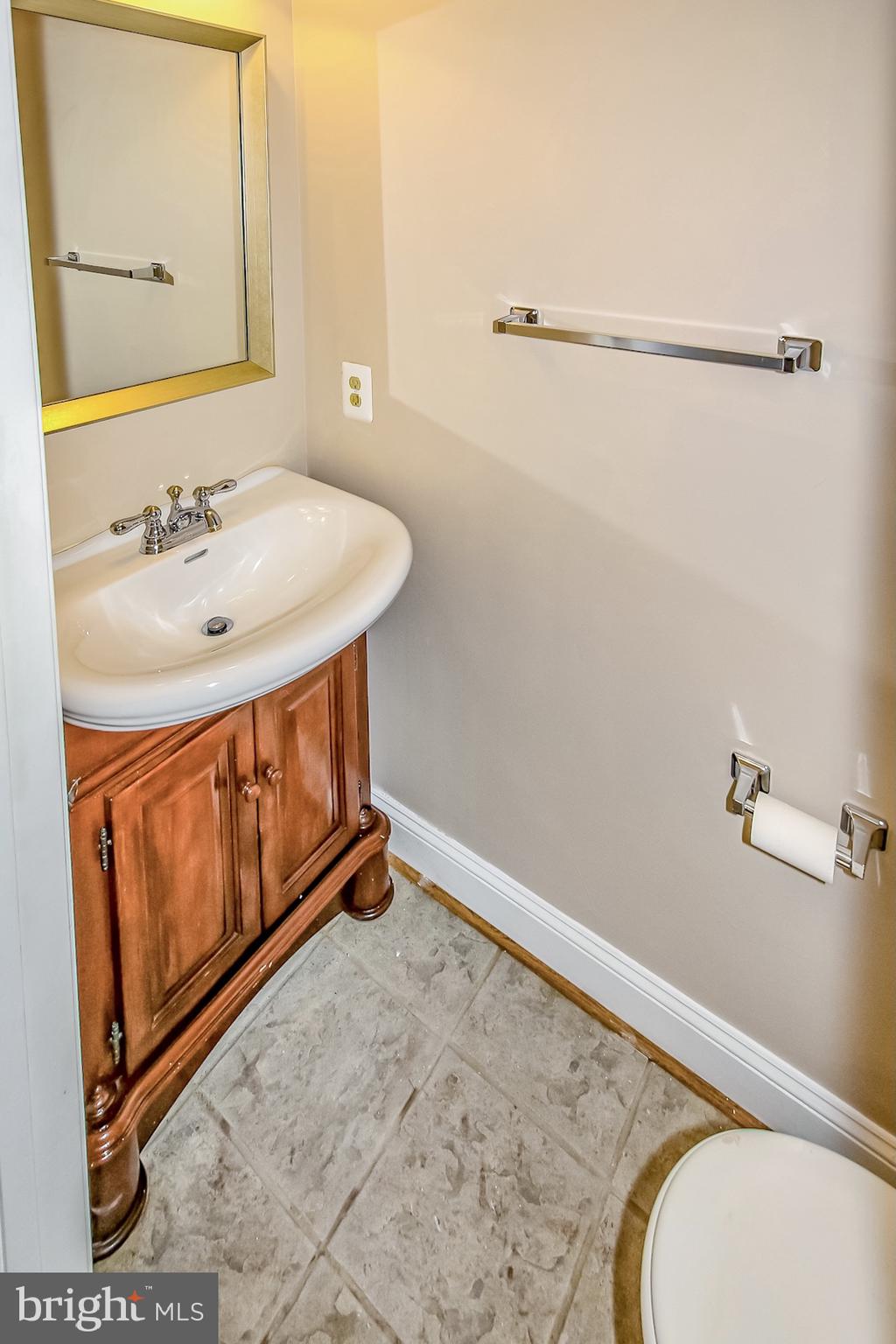 12005 Taliesin Place, Unit 13 Reston, VA 20190 - Photo 11 of 21 Powder Room near entrance