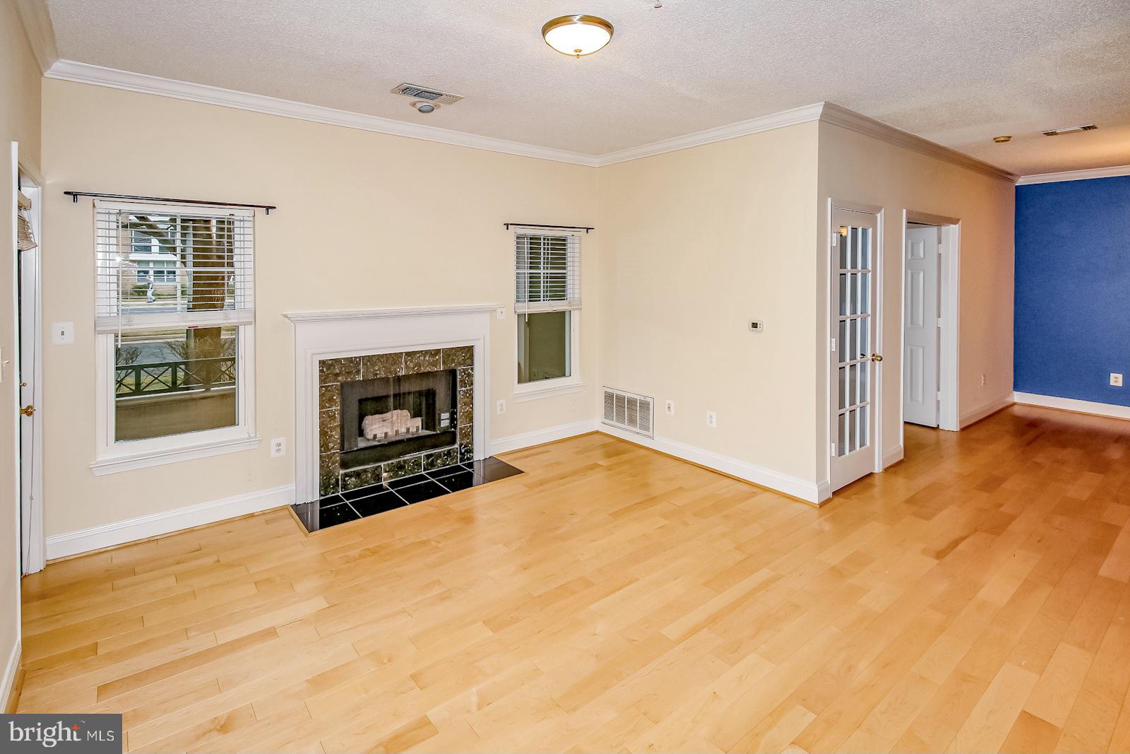 12005 Taliesin Place, Unit 13 Reston, VA 20190 - Photo 7 of 21 Living Room