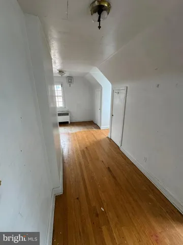 a view of a livingroom with wooden floor