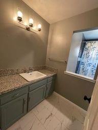 25187 Auberry Road Clovis, CA 93619 - Photo 19 of 58 a bathroom with a granite countertop sink and a mirror