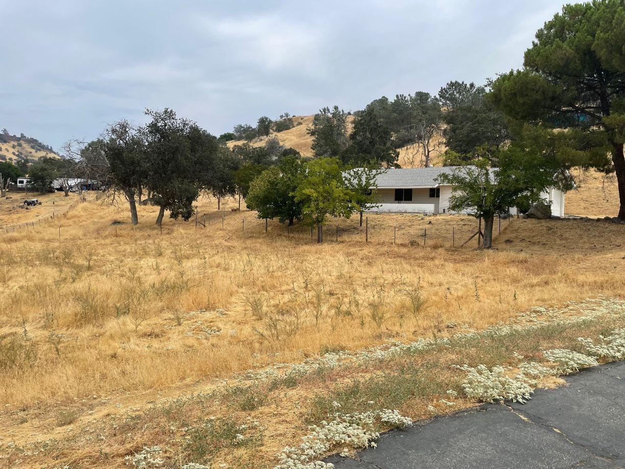 25187 Auberry Road Clovis, CA 93619 - Photo 44 of 58 a view of yard covered with snow in front of house