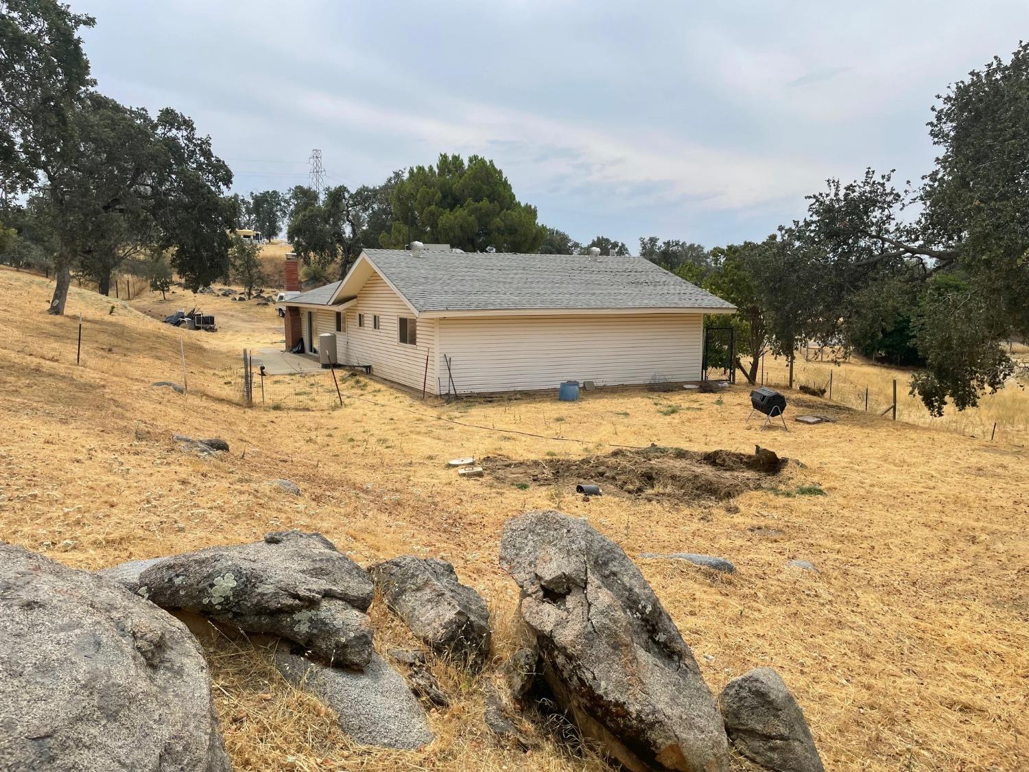 25187 Auberry Road Clovis, CA 93619 - Photo 54 of 58 a view of a houses with snow on the road