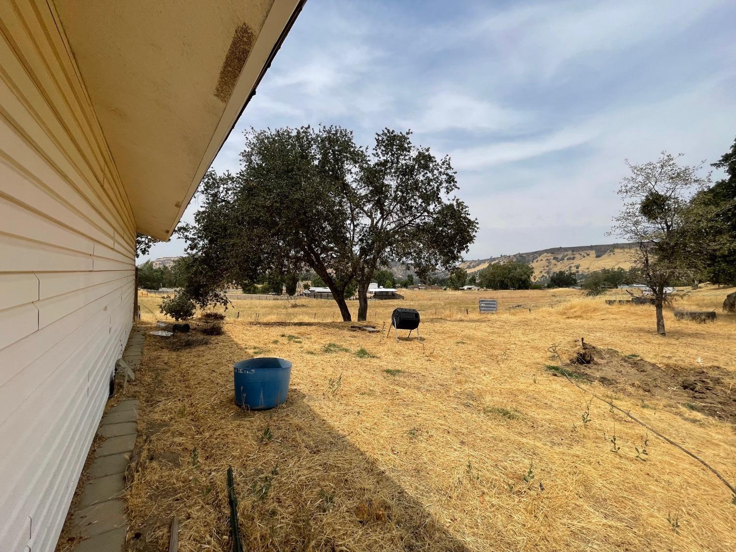 25187 Auberry Road Clovis, CA 93619 - Photo 57 of 58 a view of swimming pool with a patio