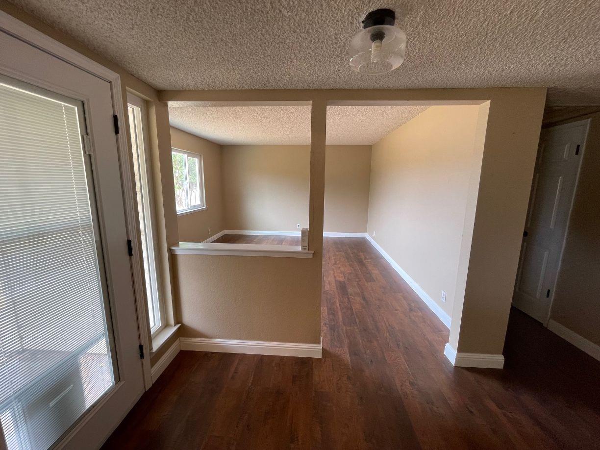25187 Auberry Road Clovis, CA 93619 - Photo 8 of 58 a view of hallway with wooden floor