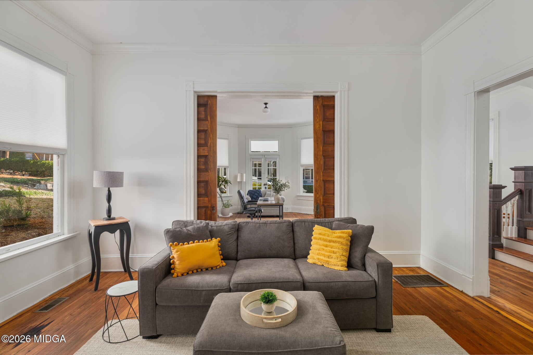 417 Orange Street Macon, GA 31201 - Photo 11 of 49 a living room with furniture and a window