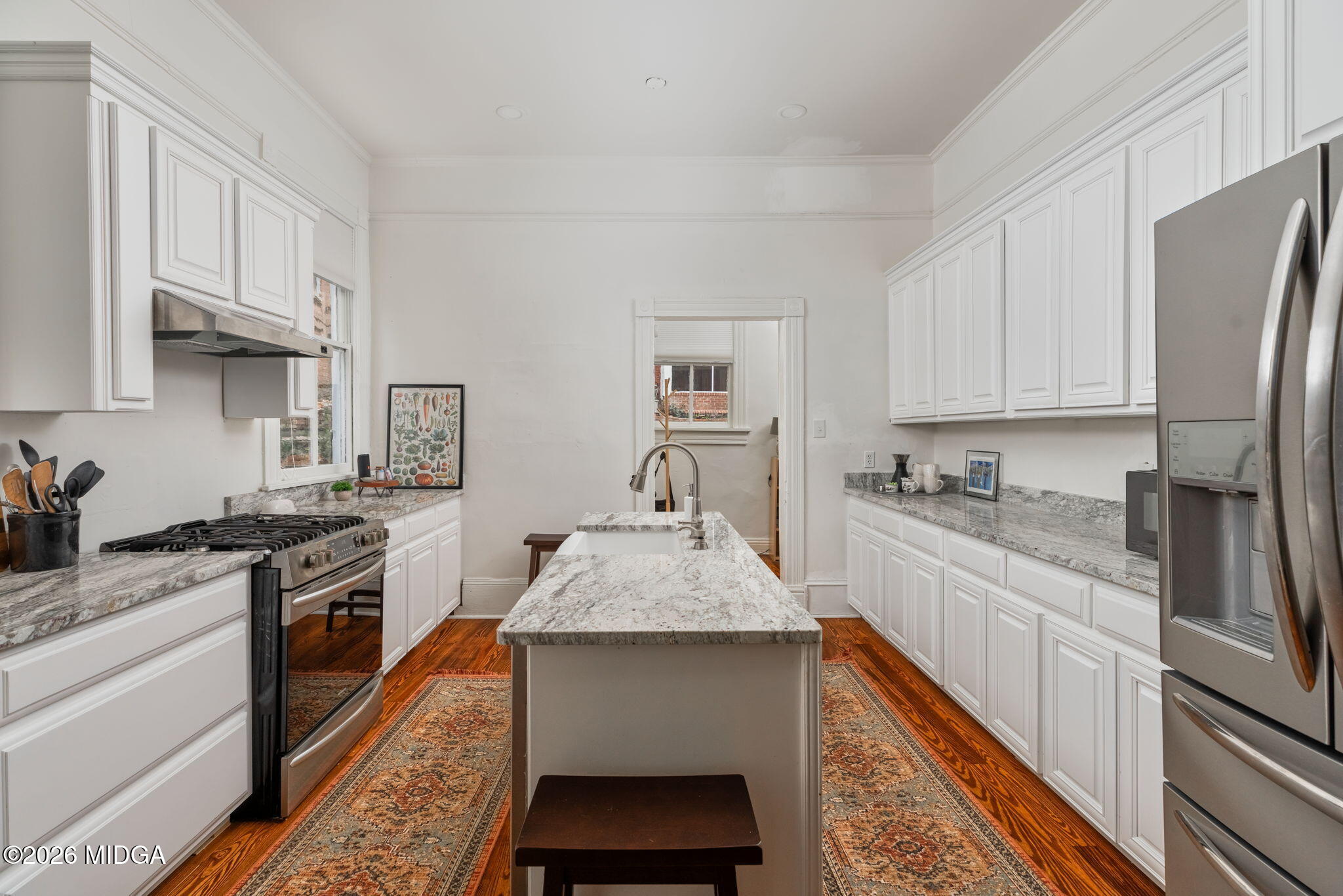 417 Orange Street Macon, GA 31201 - Photo 16 of 49 a kitchen with stainless steel appliances granite countertop a stove sink and cabinets