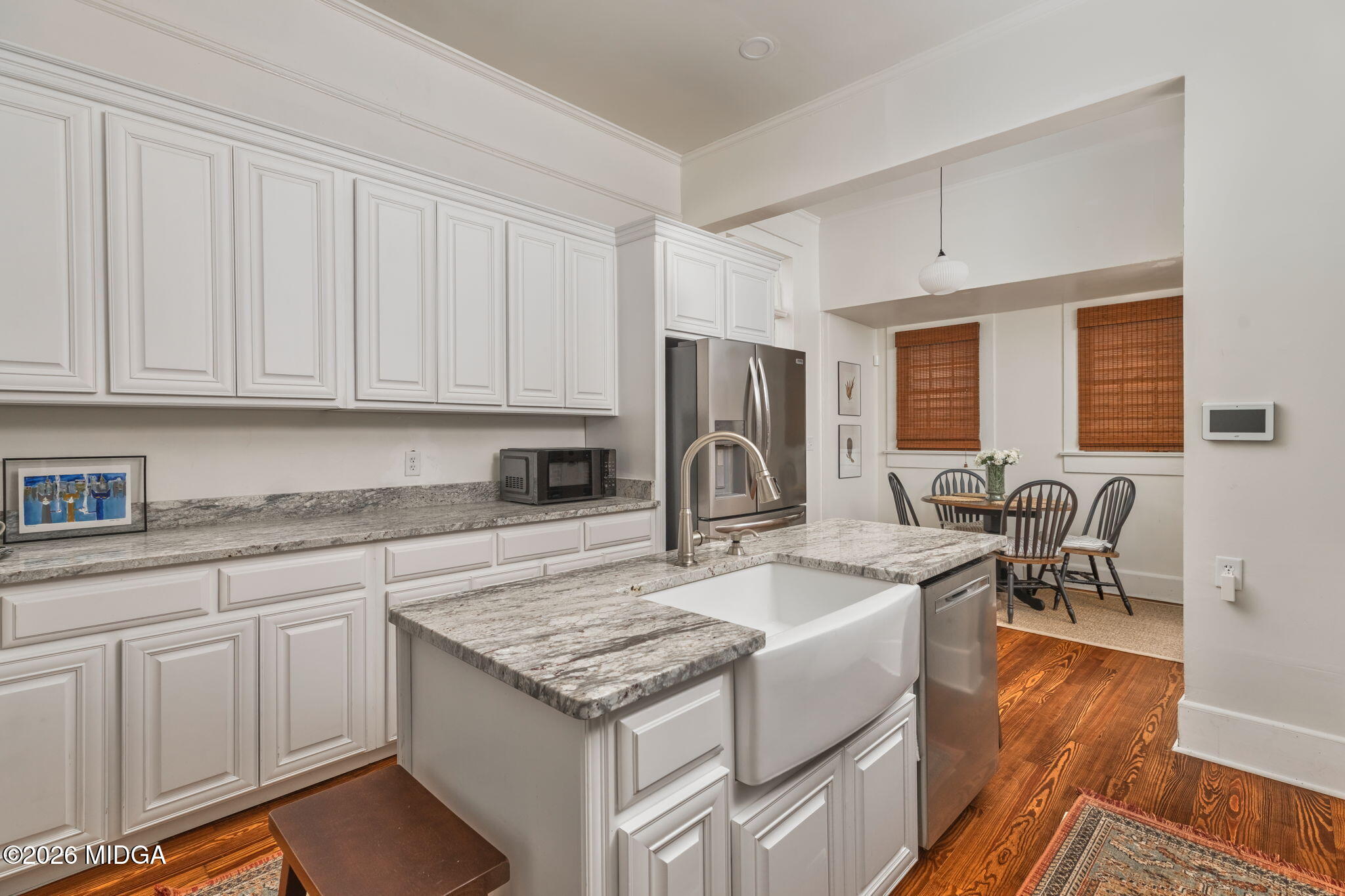 417 Orange Street Macon, GA 31201 - Photo 18 of 49 a kitchen with granite countertop a sink stove and refrigerator