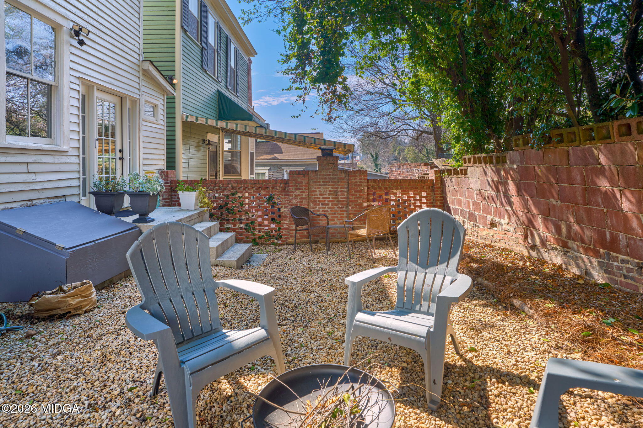 417 Orange Street Macon, GA 31201 - Photo 43 of 49 a view of a chairs and table in backyard