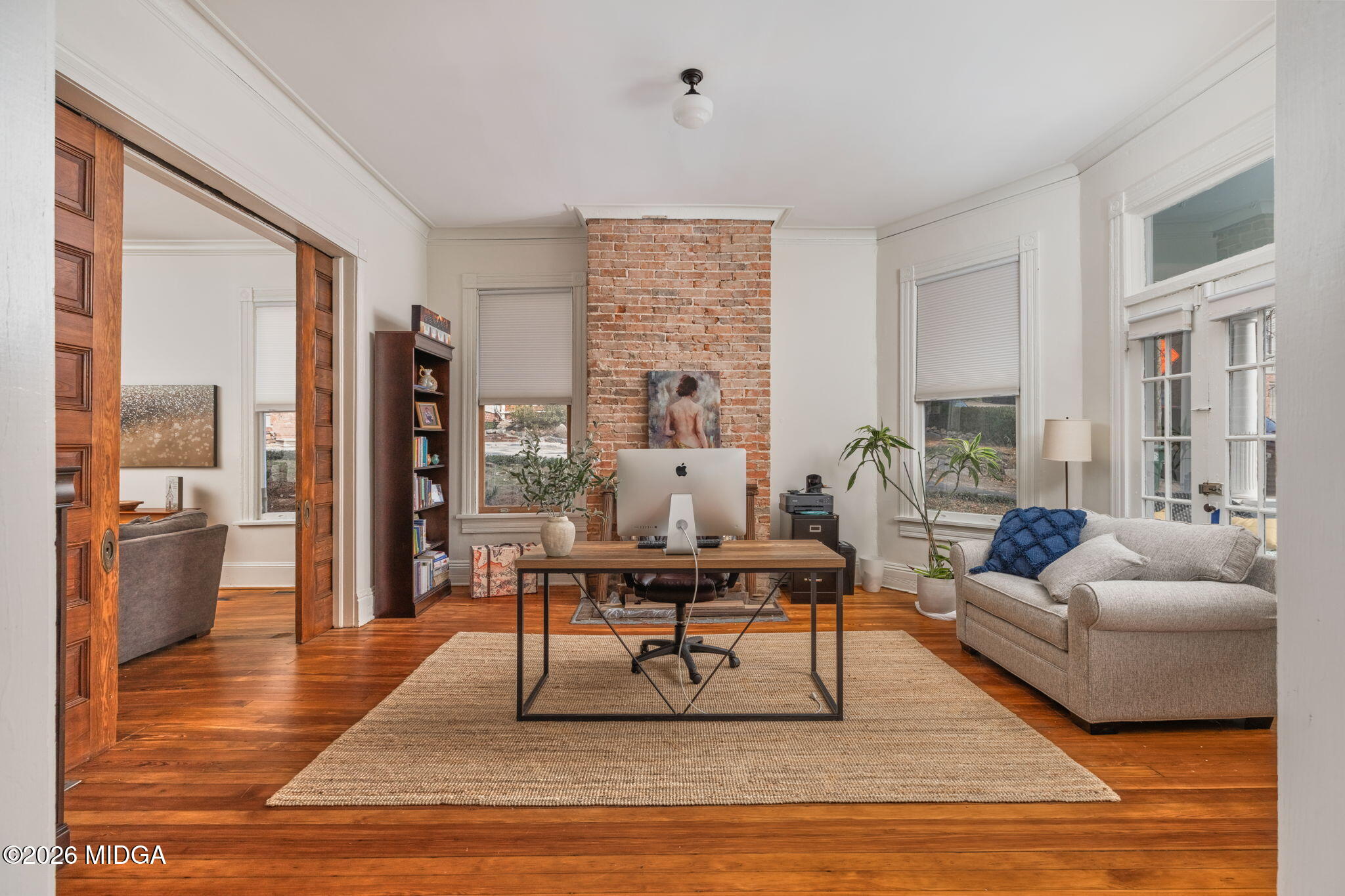 417 Orange Street Macon, GA 31201 - Photo 8 of 49 a living room with furniture and a wooden floor