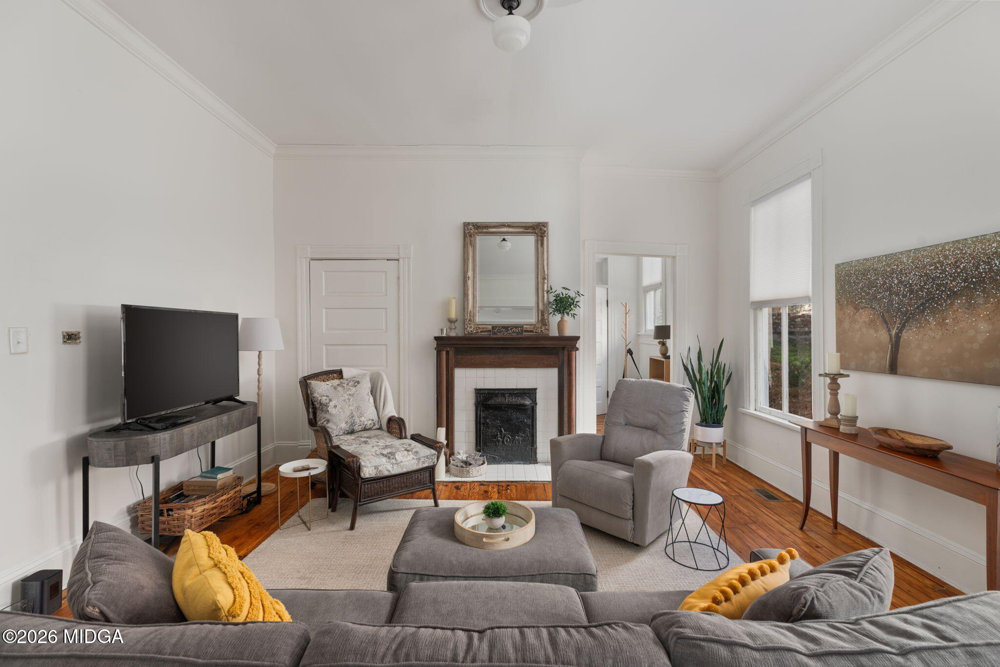 417 Orange Street Macon, GA 31201 - Photo 10 of 49 a living room with furniture and a fireplace