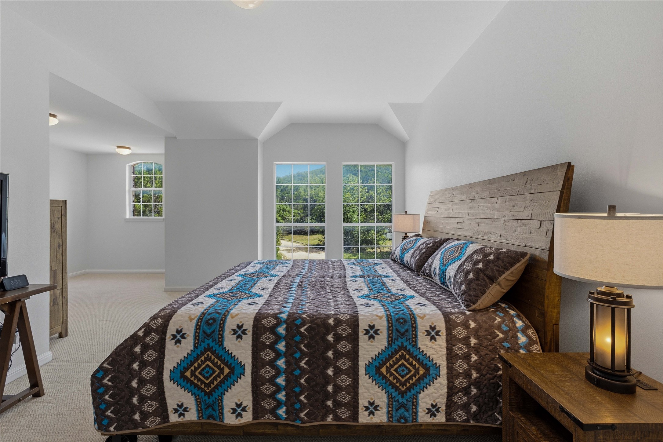 8122 Lime Creek Road Volente, TX 78641 - Photo 23 of 40 Primary Bedroom with sitting area