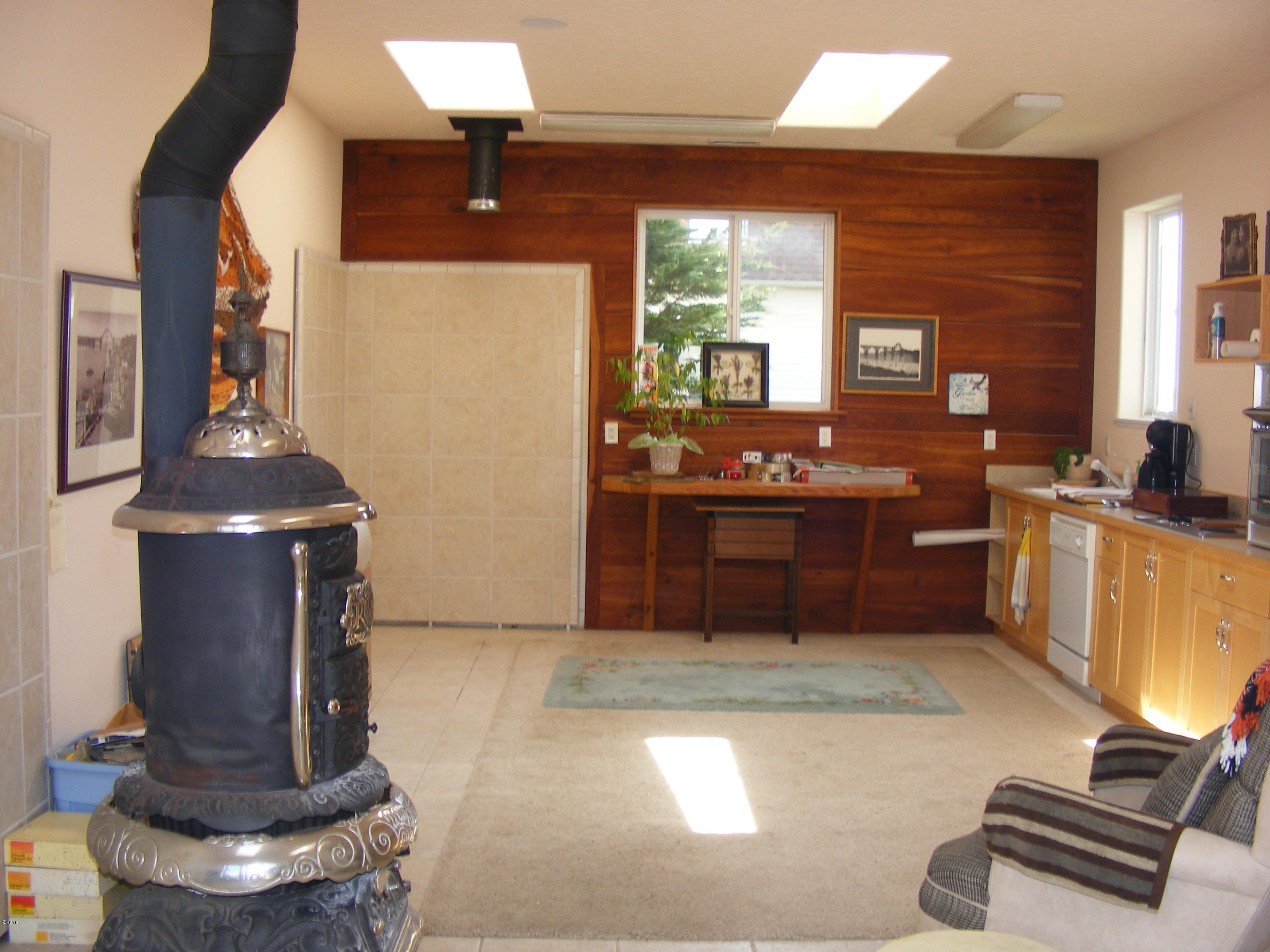 135 Southwest 26th Street Newport, OR 97366 - Photo 26 of 35 Wood Stove in Bonus Rm