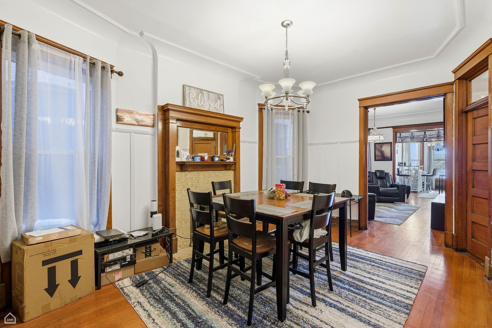 4736 South Prairie Avenue Chicago, IL 60615 - Photo 15 of 39 a view of a dining room with furniture window and wooden floor