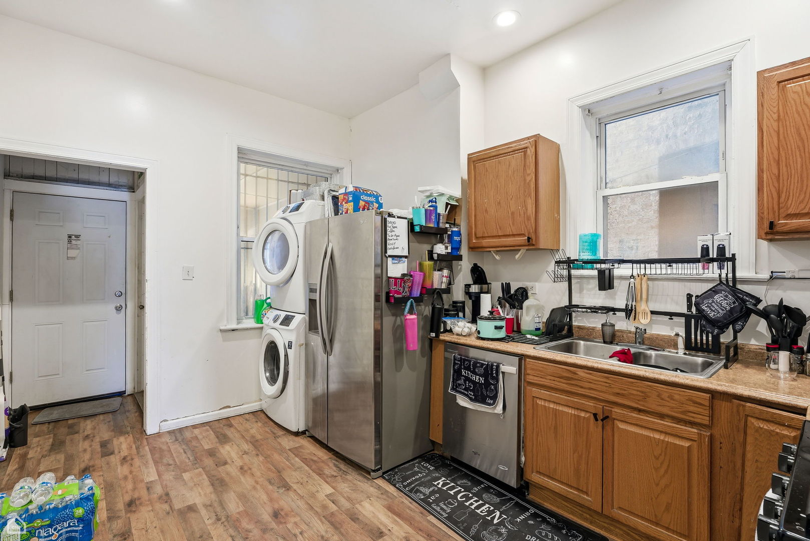 4736 South Prairie Avenue Chicago, IL 60615 - Photo 22 of 39 a view of a kitchen with fridge and sink