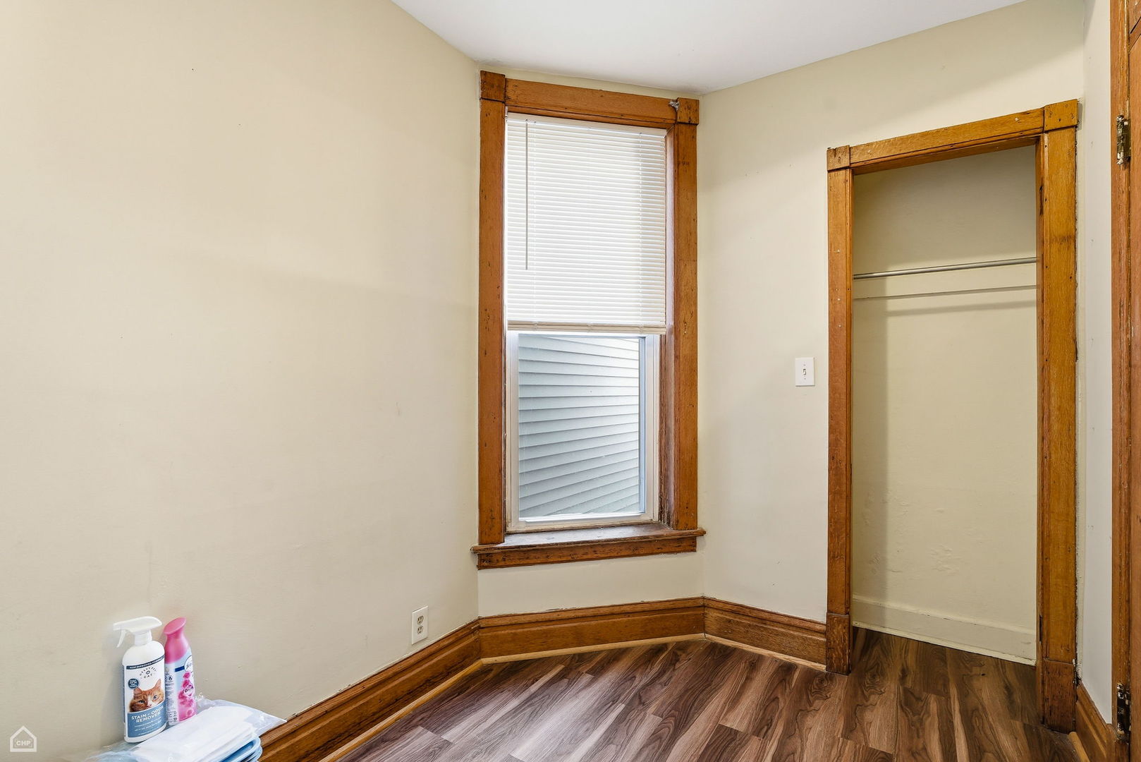 4736 South Prairie Avenue Chicago, IL 60615 - Photo 35 of 39 a view of an empty room with wooden floor and a window