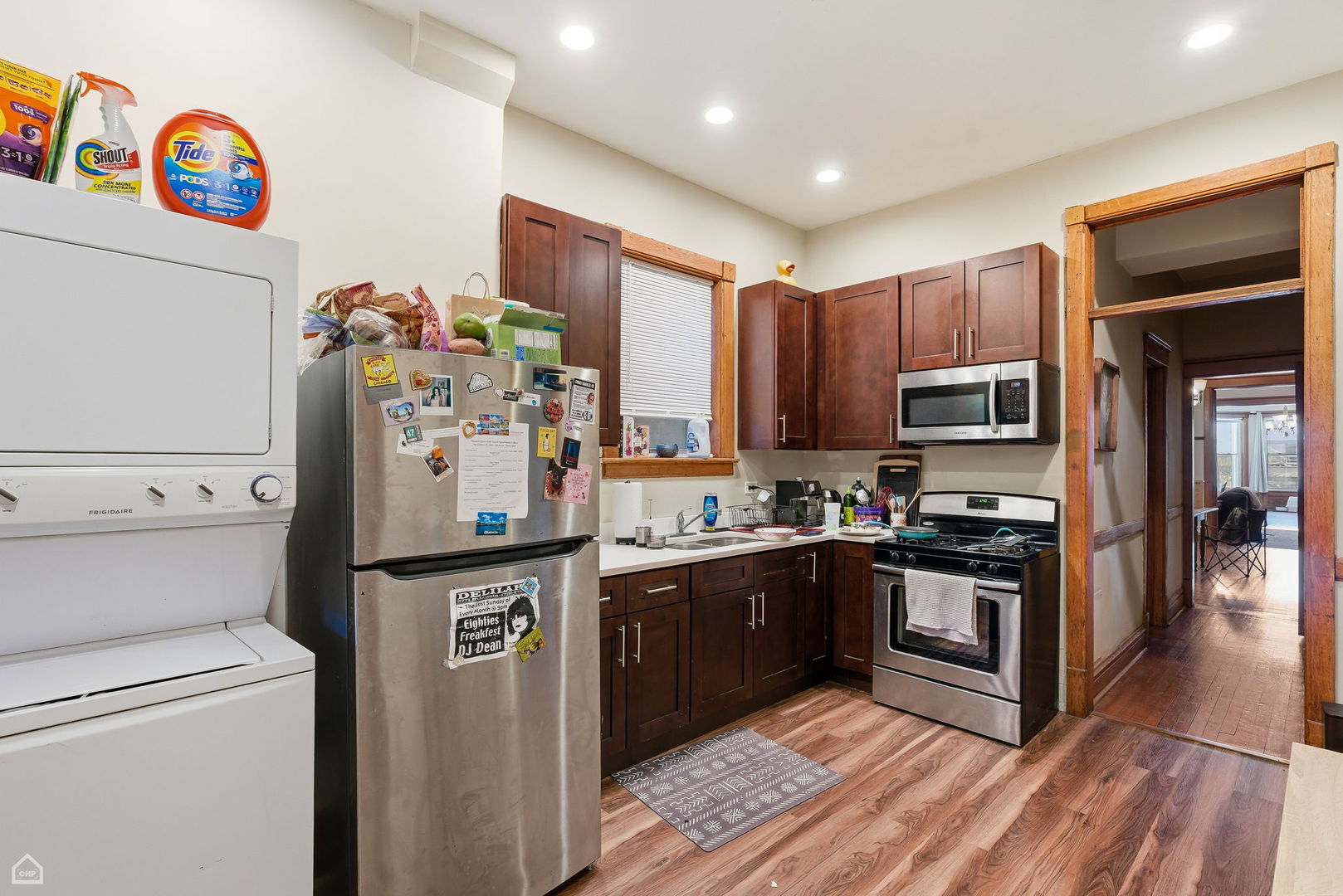 4736 South Prairie Avenue Chicago, IL 60615 - Photo 37 of 39 a kitchen with stainless steel appliances granite countertop a refrigerator and a stove