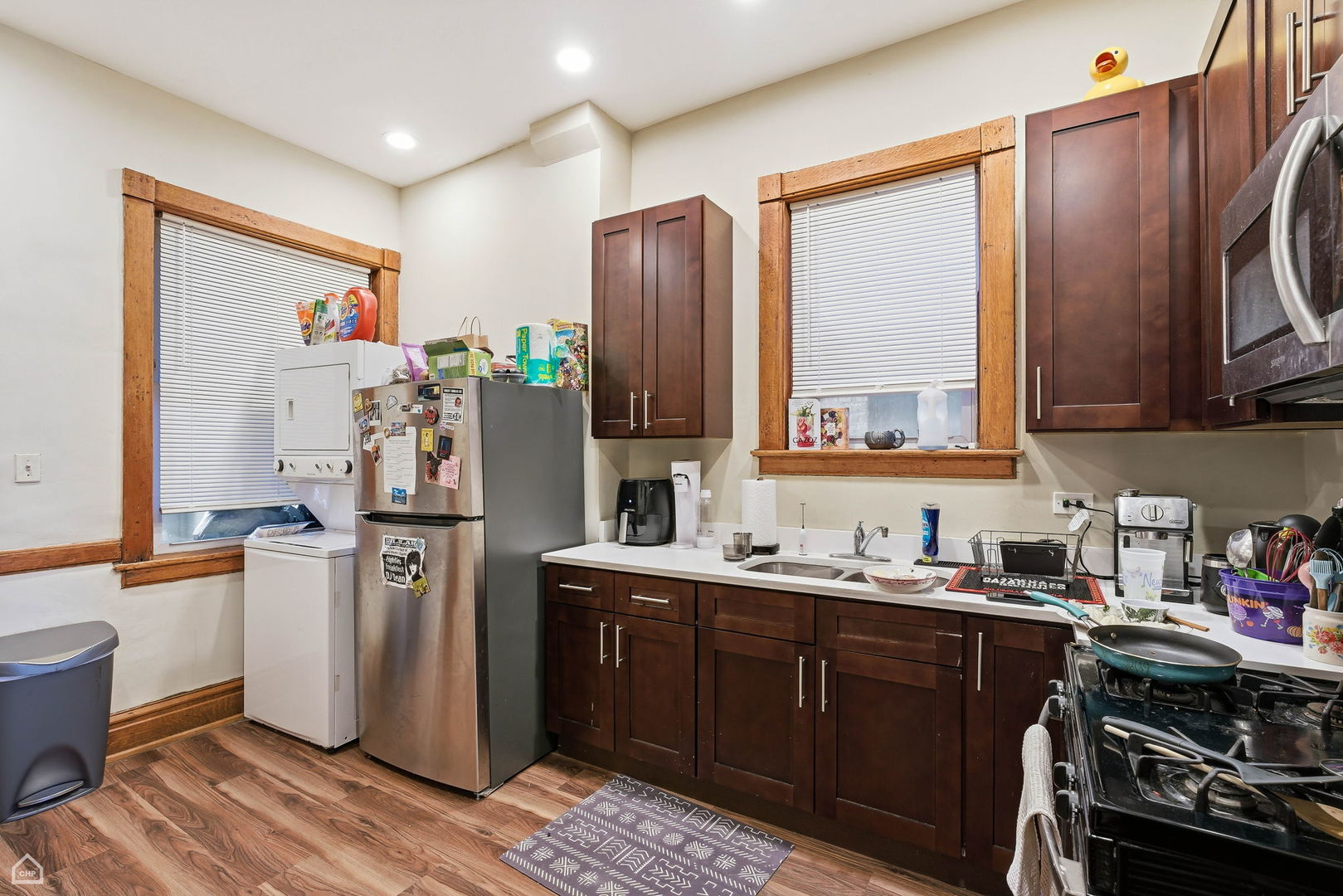 4736 South Prairie Avenue Chicago, IL 60615 - Photo 38 of 39 a kitchen with stainless steel appliances a refrigerator stove and sink