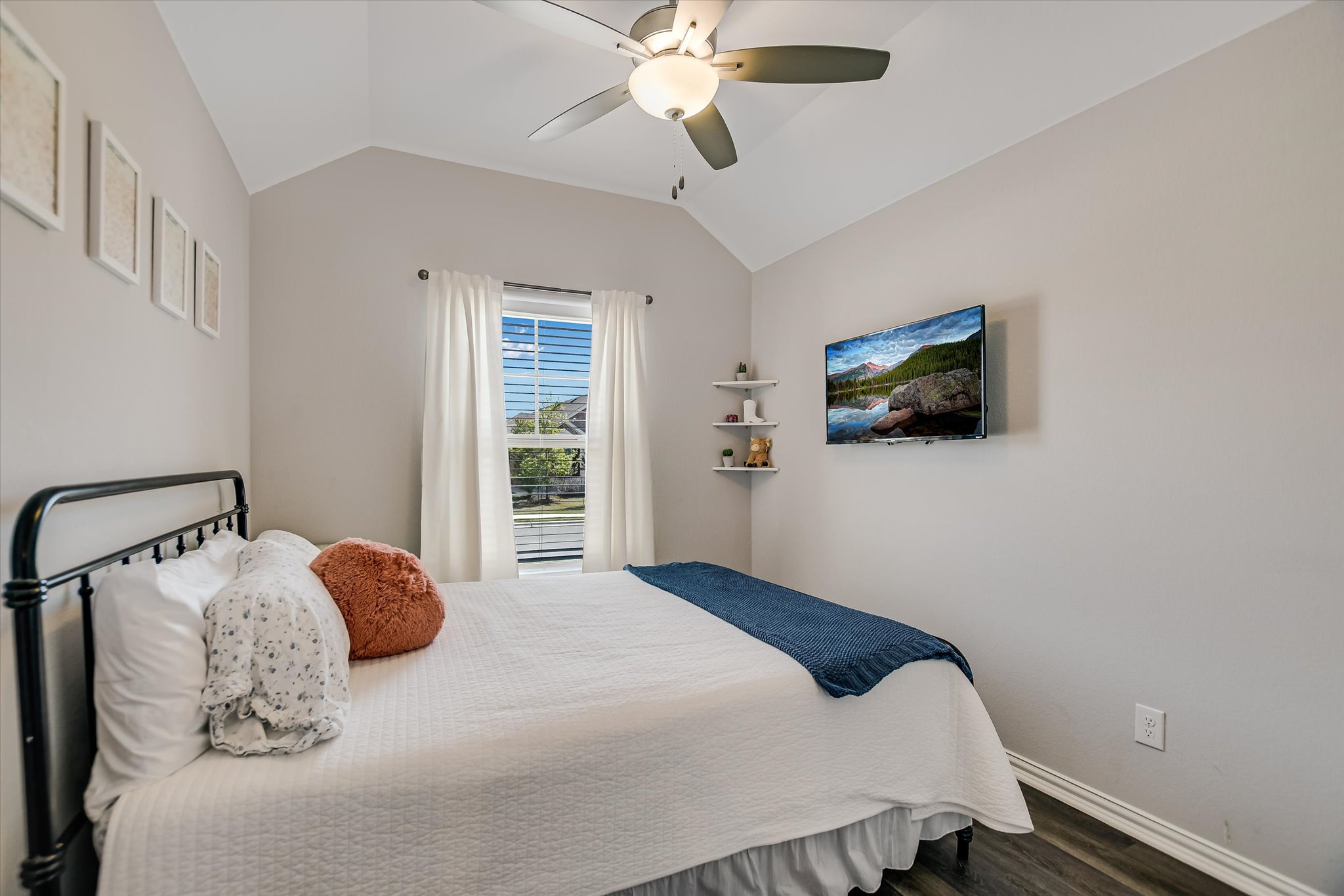 1101 Terrace View Drive Georgetown, TX 78628 - Photo 12 of 20 a bedroom with a bed and a flat screen tv