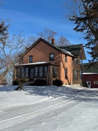 a view of a house on a street