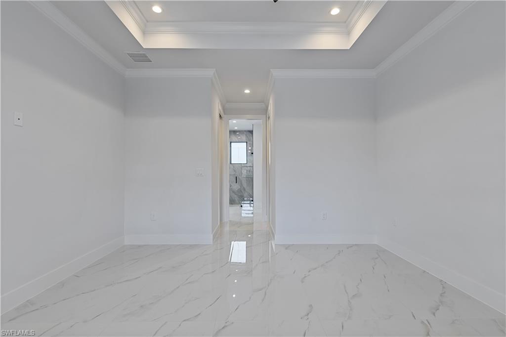 3397 14th Avenue Southeast Naples, FL 34117 - Photo 23 of 28 wooden floor in an empty room