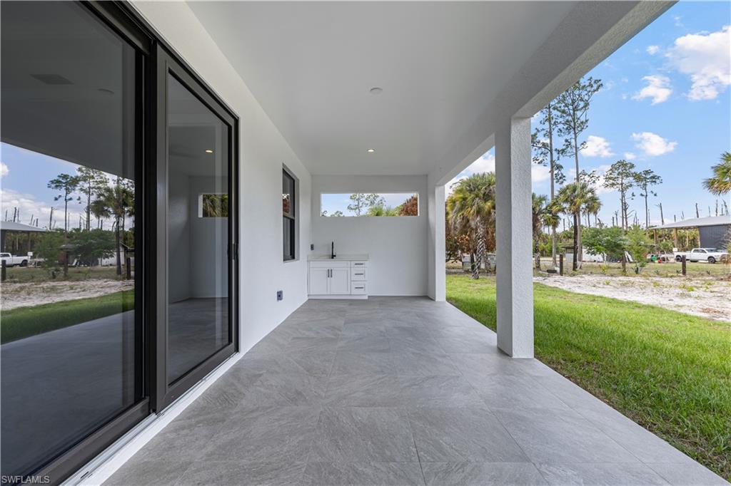 3397 14th Avenue Southeast Naples, FL 34117 - Photo 28 of 28 a view of a big room with an outdoor space and seating