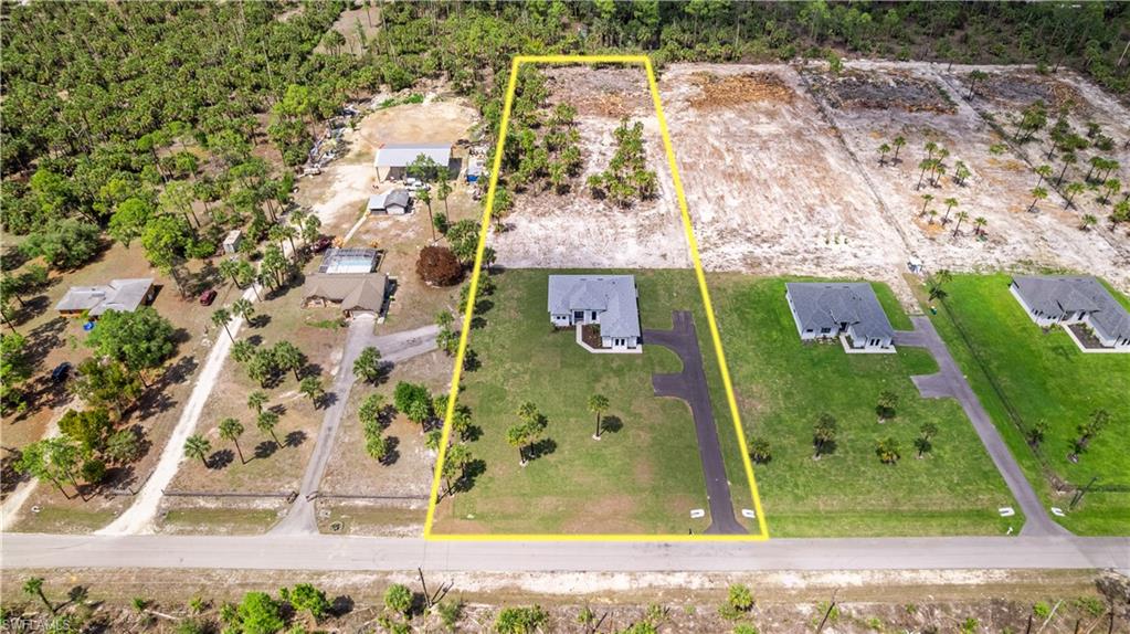 3397 14th Avenue Southeast Naples, FL 34117 - Photo 4 of 28 an aerial view of a residential houses