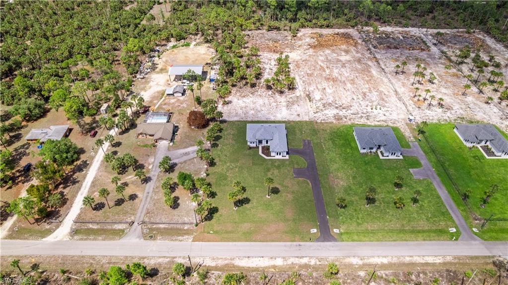 3397 14th Avenue Southeast Naples, FL 34117 - Photo 5 of 28 an aerial view of a residential houses with outdoor space
