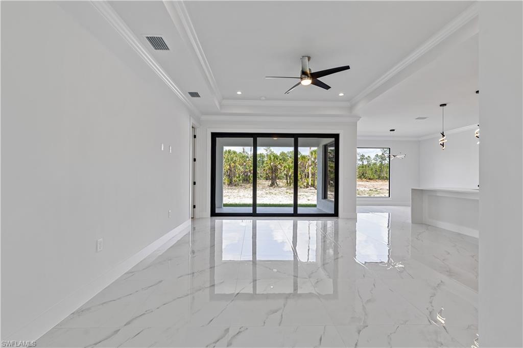 3397 14th Avenue Southeast Naples, FL 34117 - Photo 8 of 28 a view of an empty room with a window