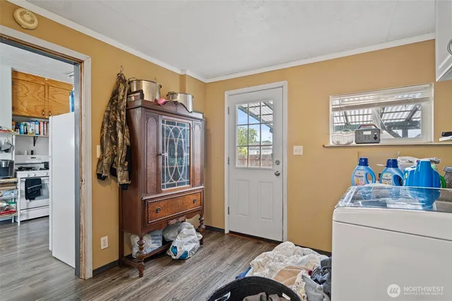 a view of livingroom with furniture and wooden floor