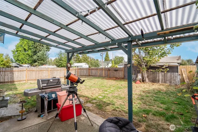 a view of swimming pool with a patio