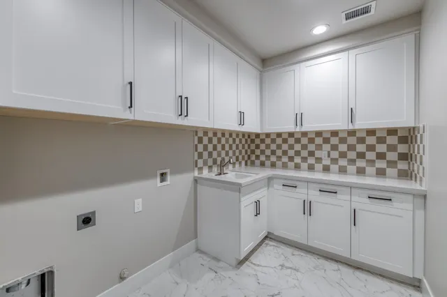 an empty room with a ceiling fan and a ceiling fan