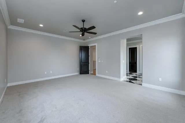 a view of a house with a yard and plants