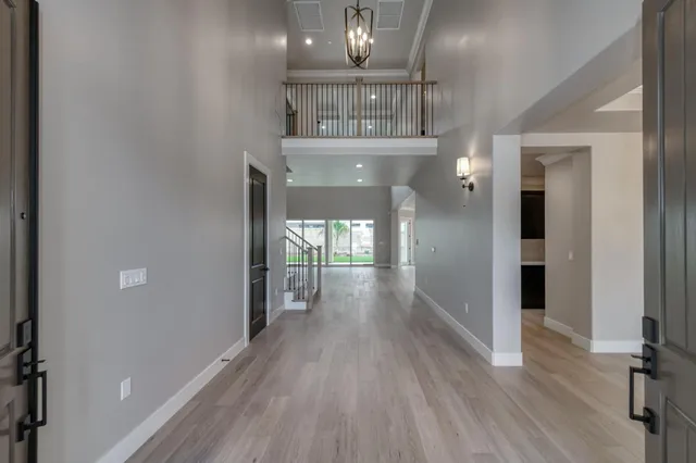 a view of gallery with wooden floor