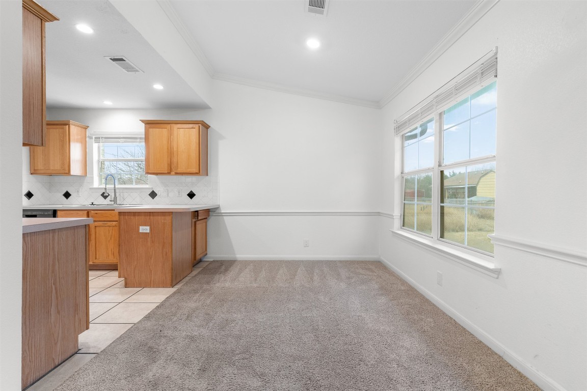 2602 Peach Tree Lane Cedar Park, TX 78613 - Photo 4 of 16 a view of a kitchen with a sink and window