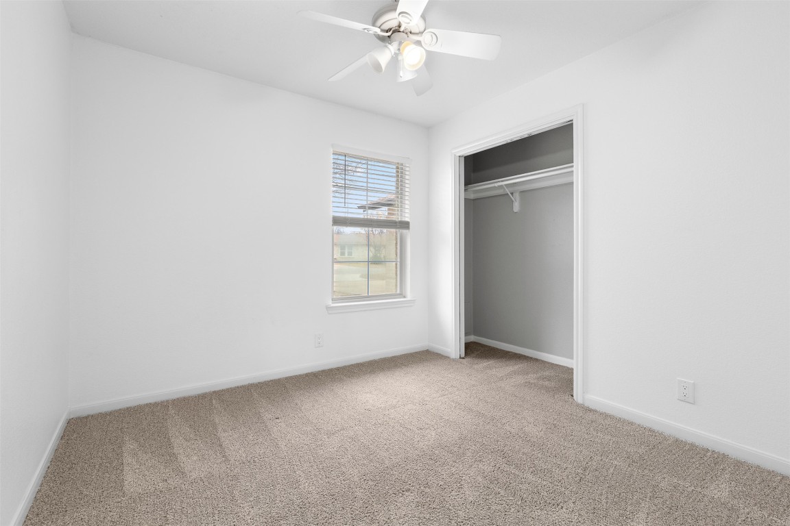 2602 Peach Tree Lane Cedar Park, TX 78613 - Photo 8 of 16 an empty room with a fan and a window