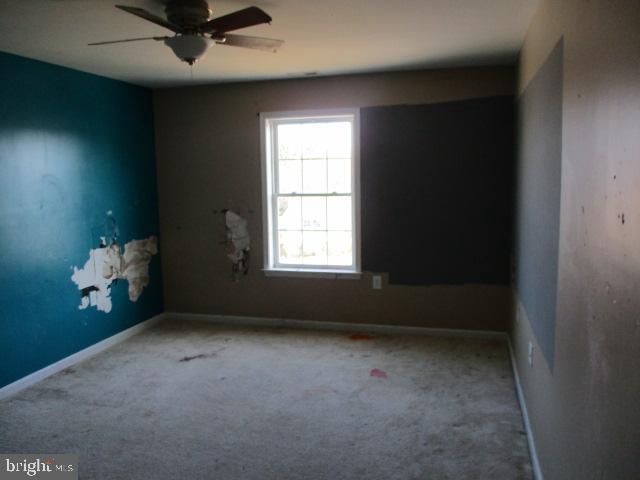 3102 Roger Road Baltimore, MD 21219 - Photo 11 of 16 an empty room with a window