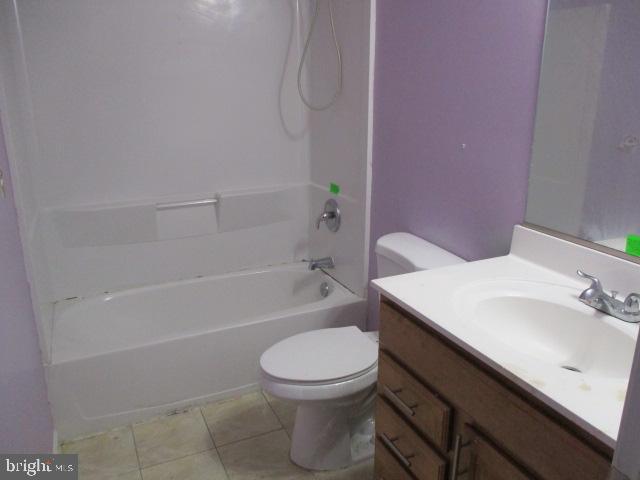 3102 Roger Road Baltimore, MD 21219 - Photo 13 of 16 a bathroom with a sink a toilet and a bathtub