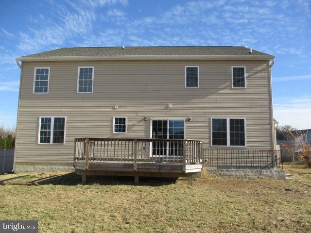 3102 Roger Road Baltimore, MD 21219 - Photo 16 of 16 a view of a house with a yard