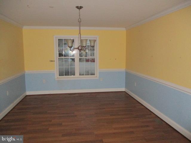 3102 Roger Road Baltimore, MD 21219 - Photo 5 of 16 a view of an empty room with window