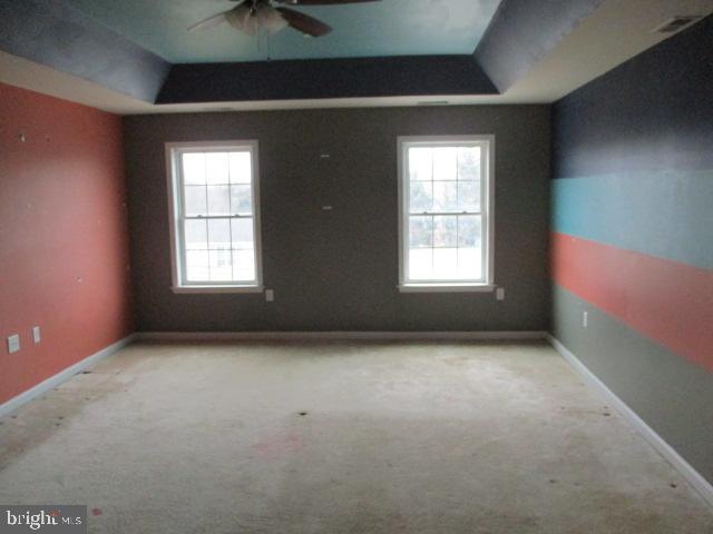 3102 Roger Road Baltimore, MD 21219 - Photo 8 of 16 an empty room with windows