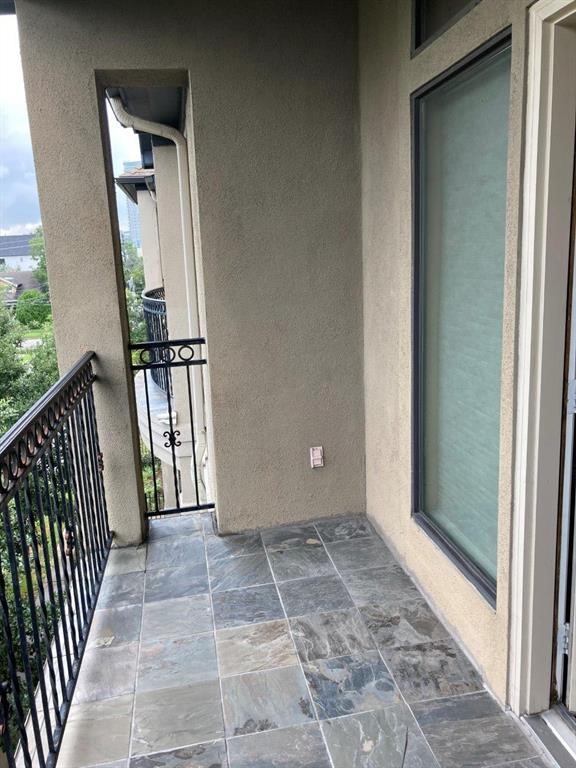 1623 Stuart Street Houston, TX 77004 - Photo 7 of 24 Balcony from living room has enclosed outdoor storage