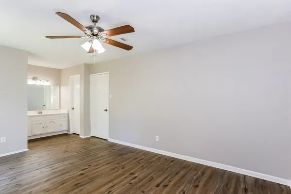 a view of a livingroom with wooden floor