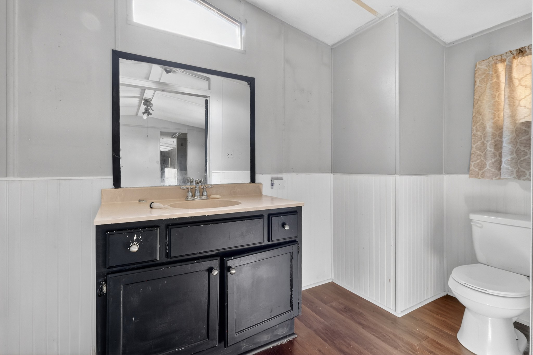 285 George Akins Road Westmoreland, TN 37186 - Photo 13 of 26 a bathroom with a sink toilet and mirror